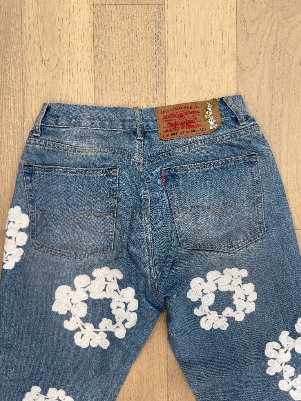 Denim Tears embroidered jeans
